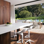 Honiton Residence White Accomplished Honiton Residence Decoration Included White Melamine Countertop Three Porcelain Barstools Wooden Partition And Hardwood Floor Residence Luxurious Contemporary Home In Australia With A Stylish Design