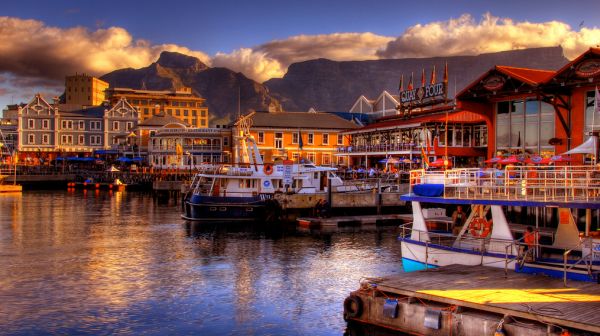 Waterfront In Design Amusing Waterfront In Cape Town Design With Several Big Ships Outside And Light Brown Colored Wooden Outer Wall Decoration  Sunset Scenery Views To See Around The World 