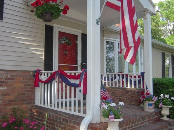 American Flag In Appealing American Flag Decor Design In The Modern House Entry With Light Brown Colored Wooden Door And White Wooden Fences Decoration  Independence Day Decor Themes To Celebrate Annual Event In Joy 