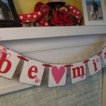 Be Mine Hanging Appealing Be Mine Message On Hanging Accessories Near Fireplace Coupled With Red White Ribbons And White Black Picture Frames Decoration  Valentine Day Mantel Decoration In Stylish Red Color Designs 