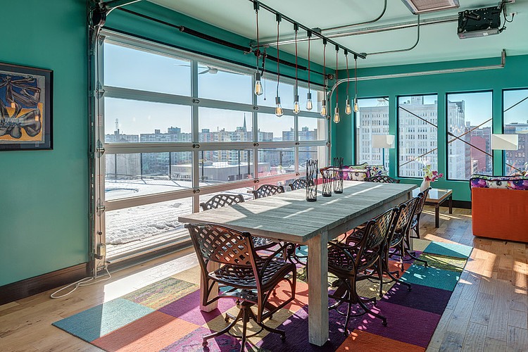 Wooden Table Chairs Attractive Wooden Table And Iron Chairs In Downtown Penthouse Loft Sk Interiors Dining Room With Colorful Carpet Interior Design  Penthouse Interior Involving Delicate Interior Design 