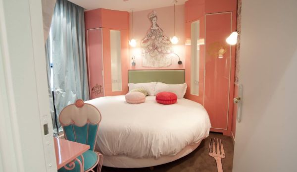 Chair And Placed Awesome Chair And Pink Desk Placed Inside Vice Versa Hotel Paris Bedroom With Round Bed And White Quilt House Designs  Hotel Interior Design Some Modern Hotel In Paris 