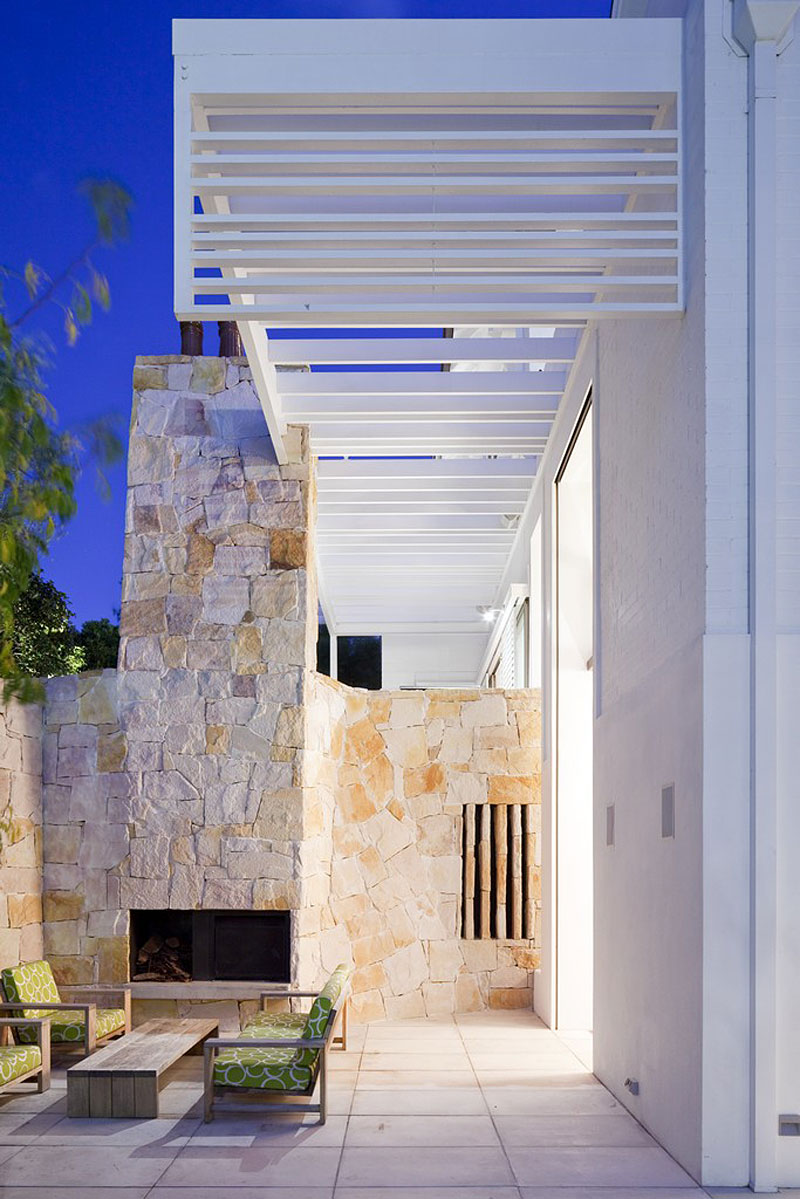 Honiton Residence White Awesome Honiton Residence In High White Rams Perforated Ceiling Covering High Stones Piles Included Fireplace Green Seats And Bench Residence Luxurious Contemporary Home In Australia With A Stylish Design
