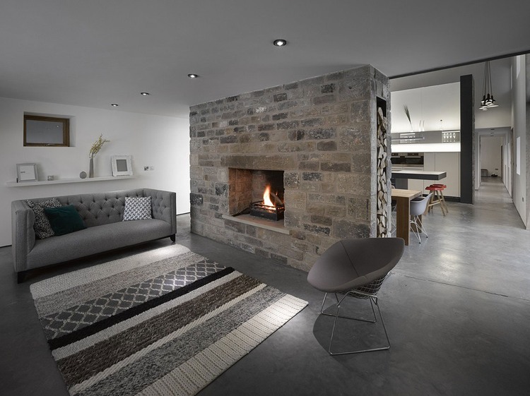 Living Room With Awesome Living Room Design Ideas With Grey Sifa And Chair Also Stone Fireplace At Cat Hill Barn Snook Architects Interior Design  Amazing Barn To House Remodelling Project With Modern Design 