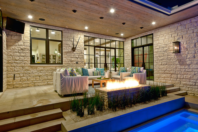 Evening Terrace Exposed Beautiful Evening Terrace With The Exposed Outdoor Fireplace Design Which Is Designed Well With The Textured Wall Panel Interior Design  Cozy House Built In Luxurious Design 