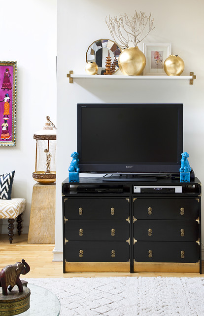 Dressers With Placed Black Dressers With Brass Detail Placed In Living Room As TV Stand Under Open Shelf Interior Design  Unique Dressers Style For Decorating Modern Interior Design 