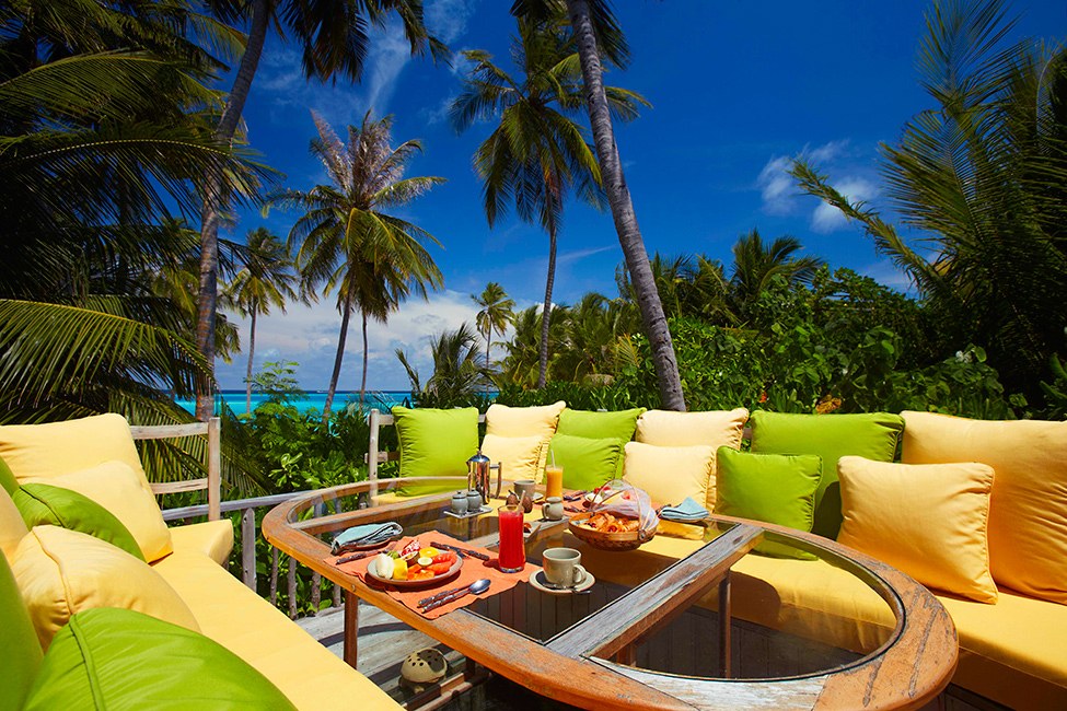 And Fresh Green Bright And Fresh Yellow And Green Cushions And Sofa Of Gili Lankanfushi Resort Porch Architecture  Floating Resort Design For Young Lovers 