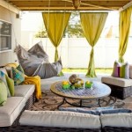 Covered Porch Green Brilliant Covered Porch Design With Green Curtain And Bannock Decorated With Round Coffee Table Also Rattan Sofa Decoration  Indoor Hanging Chair For Relaxation Time And Room Decoration 
