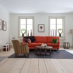 Living Space Industrial Captivating Living Space Design Of Industrial Touch Apartment Sweden With Light Orange Colored Sofa And Dark Floor Carpet Decoration  Industrial Decor Ideas Completed With Colorful Tones 