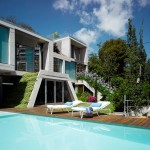 Outdoor Living Of Captivating Outdoor Living Space Design Of Garden Banon House With Blue Swimming Pool And White Colored Tanning Chair Architecture  Perfect Modern House Design With Spacious And Pretty Garden 