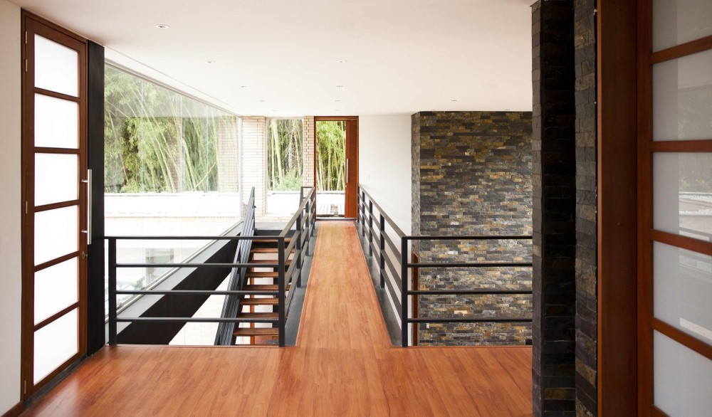 Wooden Flooring Story Captivating Wooden Flooring For Top Story Of Olaya House Completed With Black Railing And Combined With White Painting Residence  Contemporary Residence Engaging With The Nature 