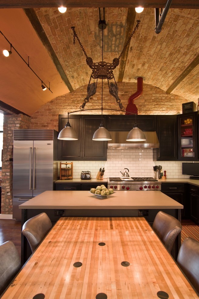 Three In Design Classic Three In One Chandelier Design Above The Island At West Loop Loft Kitchen With Wooden Kitchen Table Ideas Interior Design  Rustic Interior Design Intended To Make Mild Atmosphere 