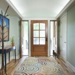 Rug Placed Floor Colorful Rug Placed On Hardwood Floor In Hallway With Wooden Desk And Grey Wall Under White Ceiling Decoration  Entryway Rug Designs Applied In Some Spots 