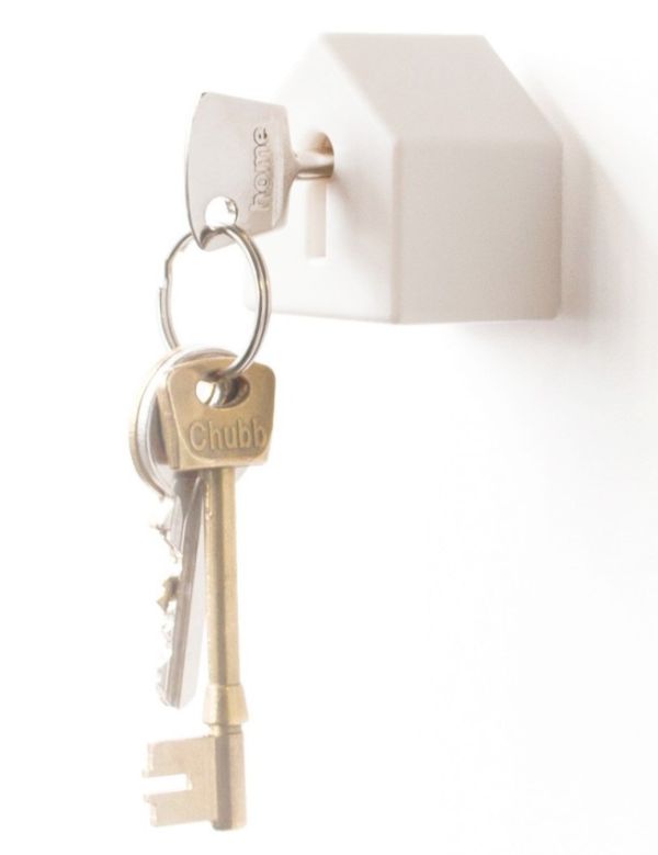 White House Using Contemporary White House Key Holder Using Key Hole Shape On The White Wall Inside Innovative House Decoration  Key Holder Designs For Your Complete Excitement 