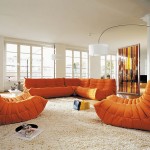 Orange Togo Artistic Cool Orange Togo Sofa White Artistic Arch Lamps Spacious Living Room Cream Rug Tiny Coffee Table Furniture  Togo Sofa Adding Contemporary Touch Instantly For Your Room 