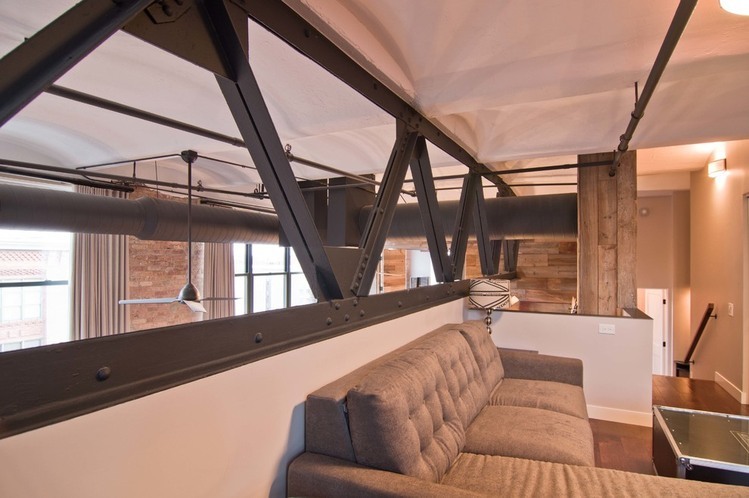 Living Room Space Cozy Living Room In Small Space With Grey Sectional Sofa Also Metal Bridge Frame Decoration Inside West Loop Loft Interior Design  Rustic Interior Design Intended To Make Mild Atmosphere 
