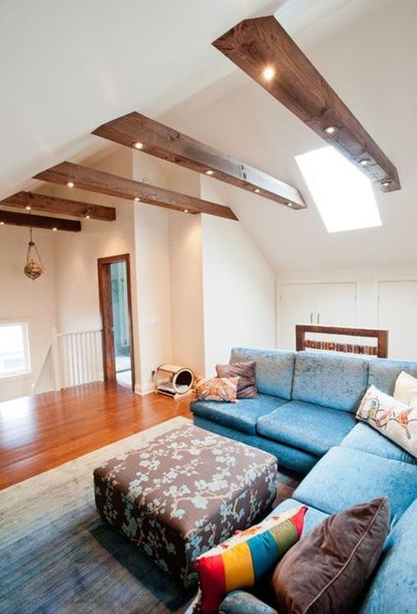 Living Room Sectional Cozy Living Room With Blue Sectional Sofa And Flower Coffee Table Under Beams Ceiling With Skylight Window Decoration  Living Decorating Ideas By Using Exposed Beams And Trusses 