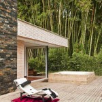 Outdoor Lounge White Cozy Outdoor Lounge With Relaxing White Chaise With Black Bolster And Red Rug Positioned Next To Outdoor Tub Residence  Contemporary Residence Engaging With The Nature 