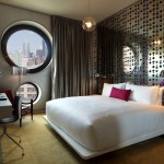 Dream Downtown Style Deluxe Dream Downtown Hotel Bedroom Style Using White Bed And Couch Purple And White Pillows In Silver Wall Glass Round Glass Architecture  Amazing Hotel Building With Metal Panels 