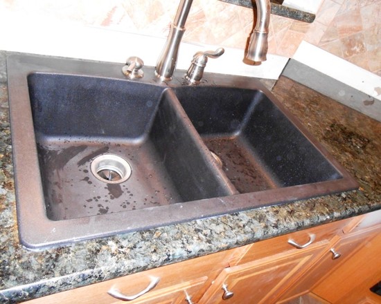 Metal Sink On Dirty Metal Sink And Faucet On Granite Verde Peacock Countertop At Traditional Kitchen With Light Wood Cabinet Ideas Kitchen  Kitchen Countertop Installation With Granite Material 