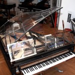 Piano With To Elegant Piano With Silver Plate To Combine With Black Leather Appropriate To Work With Warm Home Interior With Wood Tones Kitchen  Modern Interior Designs With Great Music Atmosphere 