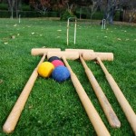 Yard Games With Enchanting Yard Games Space Design With Soft Brown Colored Wooden Polo Sticks On The Vast Garden Filled With Green Grass  Backyard Party Decor Creating Best And Coolest Event Ever 