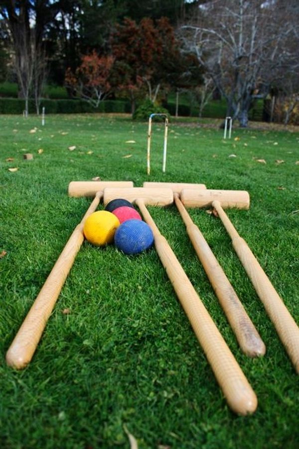 Yard Games With Enchanting Yard Games Space Design With Soft Brown Colored Wooden Polo Sticks On The Vast Garden Filled With Green Grass Backyard  Backyard Party Decor Creating Best And Coolest Event Ever 