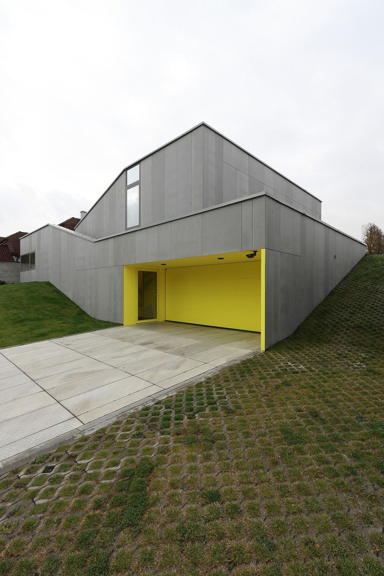 Yellow Garage At Exquisite Yellow Garage Door Design At House K2 Pauliny Hovorka With Concrete Driveway And Glass Entry Door House Designs  Modern Interior Design From A House With Minimalist Furnishing 