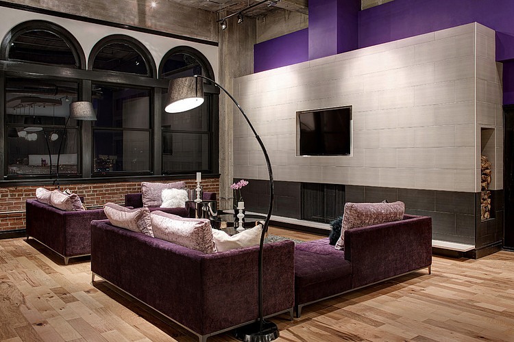 Arc Lamps Downtown Fabulous Arc Lamps In The Downtown Penthouse Loft Sk Interiors Living Room With Purple Sofas And Grey Fireplace Interior Design  Penthouse Interior Involving Delicate Interior Design 