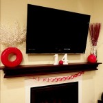 Flatcreen Tv Mixed Fabulous Flatcreen Tv Above Fireplace Mixed Wooden Mantel And Decorative Red Vase Coupled With Creamy Wall Decoration  Valentine Day Mantel Decoration In Stylish Red Color Designs 