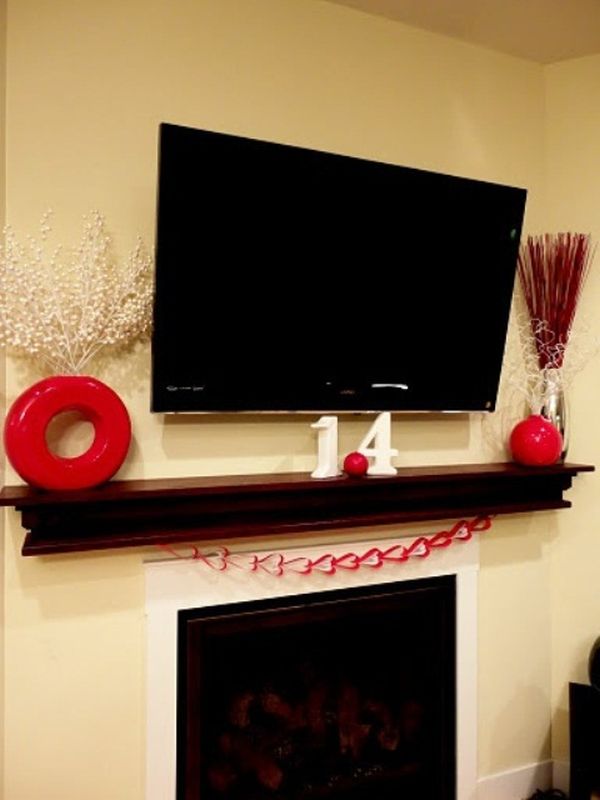 Flatcreen Tv Mixed Fabulous Flatcreen Tv Above Fireplace Mixed Wooden Mantel And Decorative Red Vase Coupled With Creamy Wall Decoration  Valentine Day Mantel Decoration In Stylish Red Color Designs 