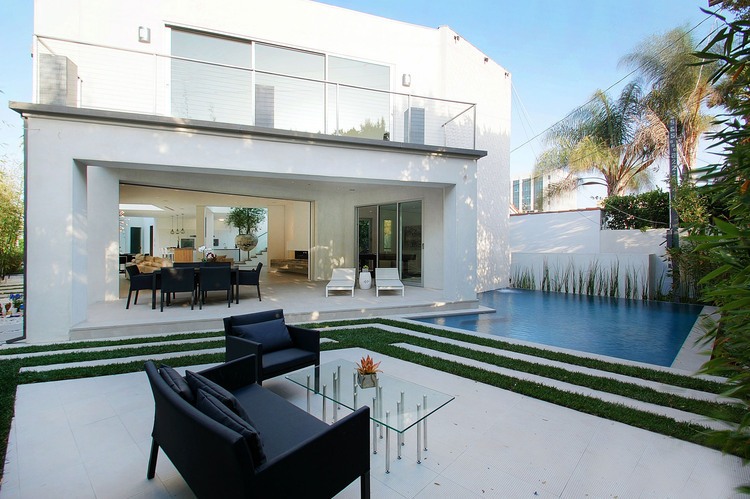 Backyard With Swimming Fascinating Backyard With Patio And Swimming Pool At Mansfield House Amit Apel Add With Glass Top Table And Black Chair Decoration  Gorgeous Family House Decorating With Minimalist Patio 