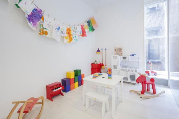 Kids Playroom Apartment Fascinating Kids Playroom In Flatiron Apartment Loft With Colorful Furniture And Garland Above Lightened From Window Decoration  Minimalist White Loft Designs With Classic Look To Express Your Self 