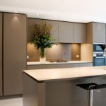 Kitchen Cabinets Grey Grey Kitchen Cabinets And A Grey Island Near The Black Stools Kitchen  Modern Kitchen Cabinets With Additional Decorations 