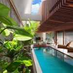 Fresh And Narrowed Incredible Fresh And Relaxing Blue Narrowed Norwich Drive Residence Swimming Pool With Lush Vegetation Growing Along The Edge Architecture  Cozy Villa Design For Absolute Relaxation 