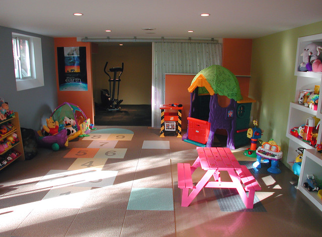 Play Room Toys Kids Play Room With Colorful Toys And Pink Table Set On Brown Carpet Tiles In Homes House Designs  Carpet Tiles In Homes Interior Decoration 
