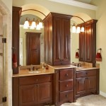 And Wooden The Lamps And Wooden Vanity In The Bathroom With Wooden Bathroom Wall Cabinets And Wide Mirrors Bathroom  Bathroom Wall Cabinets With Bright Color Accent 