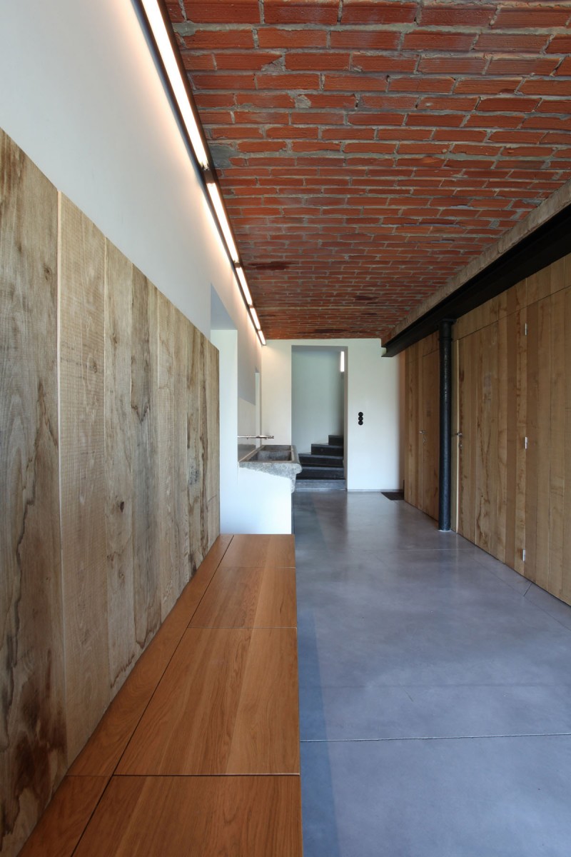 Narrow House Included Long Narrow House DM Corridor Included White Ceramic Floor Wooden Wall And Long Bench With Long Bricks Ceiling Architecture  Converted Home Project In Contemporary Style Designs 