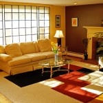 Sofa In Room Long Sofa In The Living Room With Brick Fireplace And Wide Carpet Tiles Near It Interior Design  Carpet Tiles With Bright Color For Interior House 