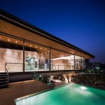Grand Pinklao Wooden Marvelous Grand Pinklao Clubhouse Officeat Wooden Deck And Illuminated Pool Design View Night With Small Staircase Architecture Stylish Cantilever House Design Built Among Expansive Green Yard
