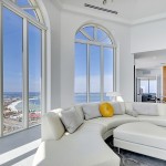 Living Room Florida Mesmerizing Living Room Decor In Florida Beach Club Penthouse Including White Pillows In Curvy Arrangement Near Wide Glass Bay Windows On Wall Interior Design  Contemporary Penthouse Offering Beach And Cityscape Horizon 
