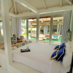 Bedroom With Bedstead Modern Bedroom With A White Bedstead And Blue Small Pillows Pool  Swimming Pool Designs For Exquisite Modern Villa 