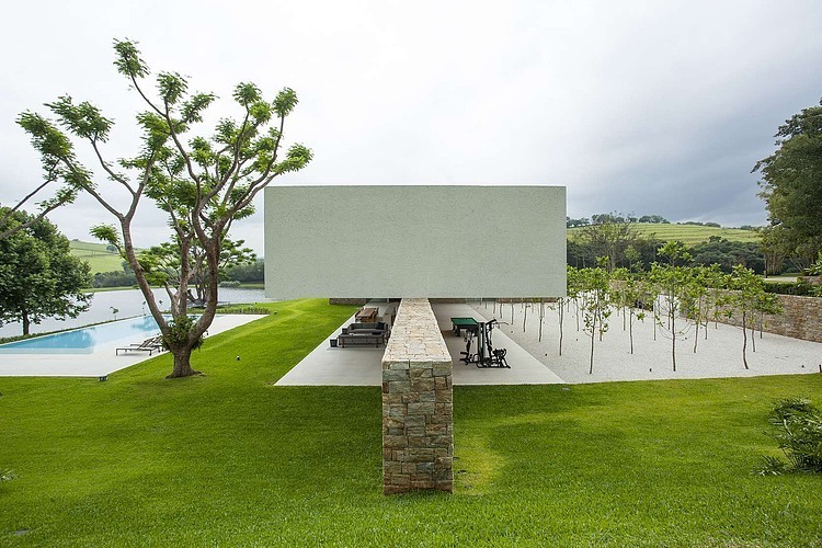 Landscape Garden Itatiba Modern Landscape Garden At Outside Itatiba Residence Roccovidal With Green Lawn Shown Also Open Space Gym Room Interior Design  Warm Interior Design From A Modern Home With Dim Lighting 