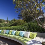 Honiton Residence Curving Natural Honiton Residence Gardening With Curving Green Round Object Green Blue And White Pillows In Front Of Green Grasses Residence Luxurious Contemporary Home In Australia With A Stylish Design