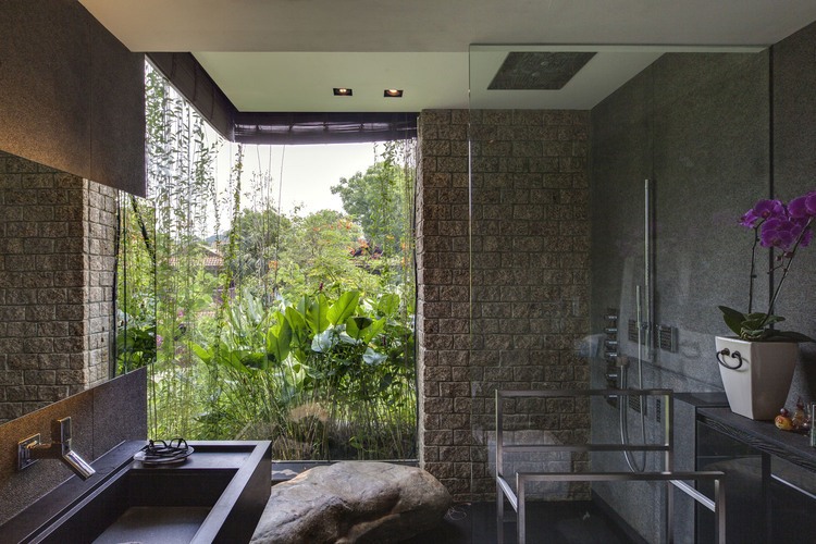 Merryn Road Architects Natural Merryn Road House Aamer Architects Master Bath Displaying Glass Shower And Concrete Vanity Exterior  Impressive Compact House Covered With Green Plants Exterior 