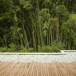 Touch For Exterior Natural Touch For Olaya House Exterior Design With Wooden Deck Completed With Gravels For Decor And Exposed Green Bamboo Trees Residence  Contemporary Residence Engaging With The Nature 