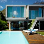 Living Space Garden Outdoor Living Space Design Of Garden Banon House With White Tanning Chair Blue Pillows And Big Swimming Pool With Blue Colored Water Architecture  Perfect Modern House Design With Spacious And Pretty Garden 