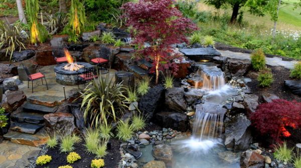 Open Space Backyard Outstanding Open Space Lounge At Backyard Area Including Waterfall Firepit On Stoney Ground Also Chair With Red Seat Near Fireplace Garden  Backyard Garden Waterfalls As Beautiful Garden Landscaping 