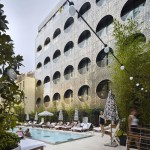 Gardening System Downtown Picturesque Gardening System Of Dream Downtown Hotel In Large Opened Swimming Pool With Lounge Chairs On Deck And Greenery Plants Architecture  Amazing Hotel Building With Metal Panels 