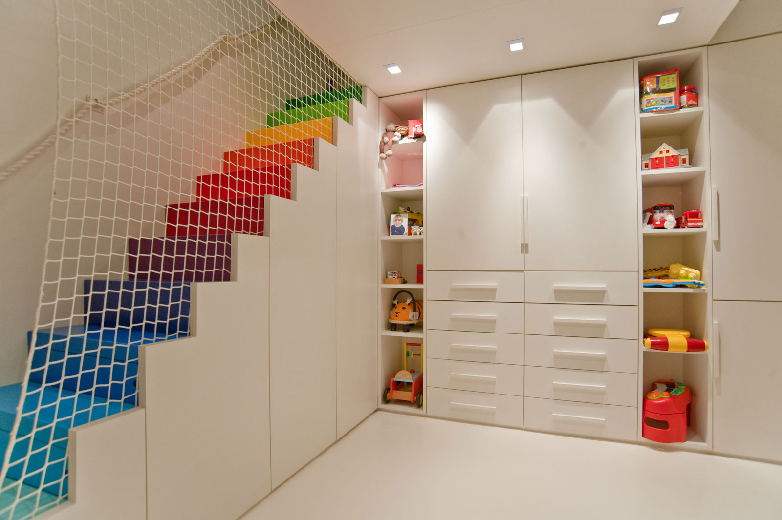 Little Venice Room Playful Little Venice House Kids Room Designed In White Interior Decorated With Rainbow Stair And Displayed Accessories In Open Shelving Interior Design  Traditional Interior Furniture Arranged In A Modern Design 